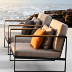 Outdoor Lounge Armchair with Teak Armrests and Black Steel Frame