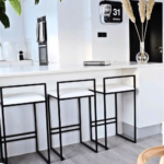 White Upholstered Bar Stool with Open Black Steel Frame